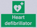 green-background-with-white-text-and-heart-defibrillator-symbol--white-cross-and~